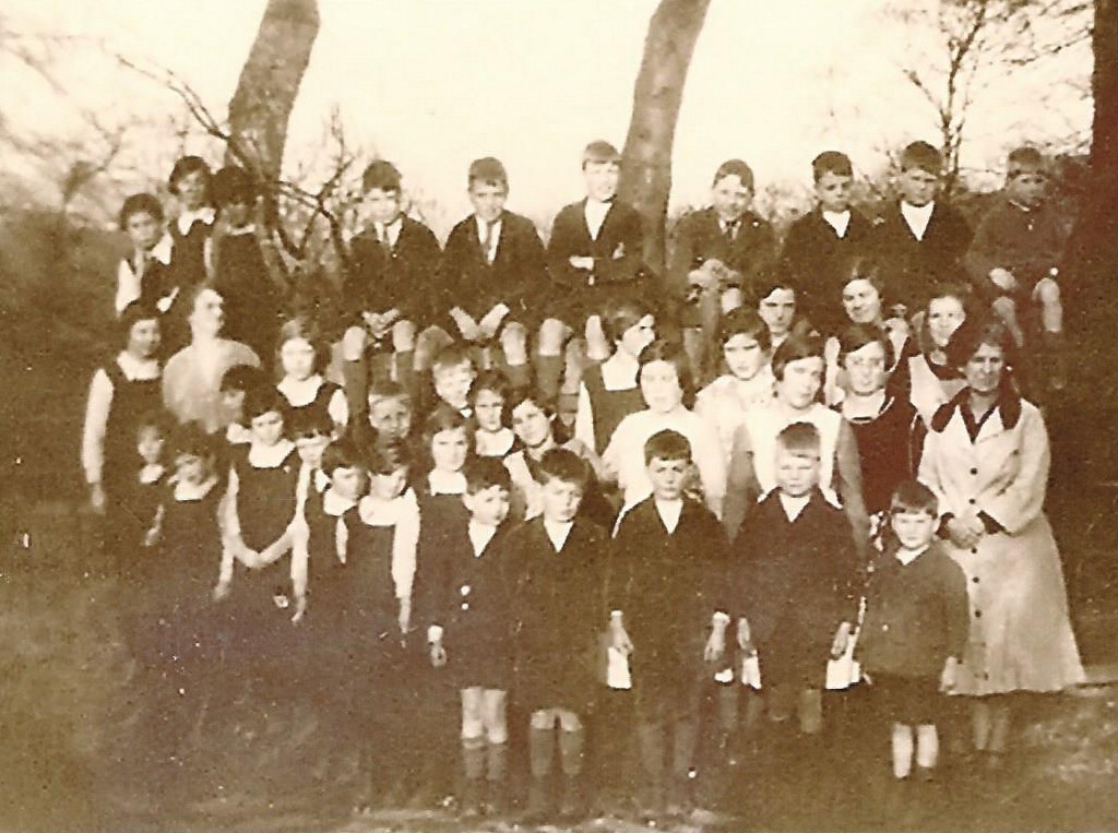 Staff and children at the gate to Cherrytree Orphanage, 1920s